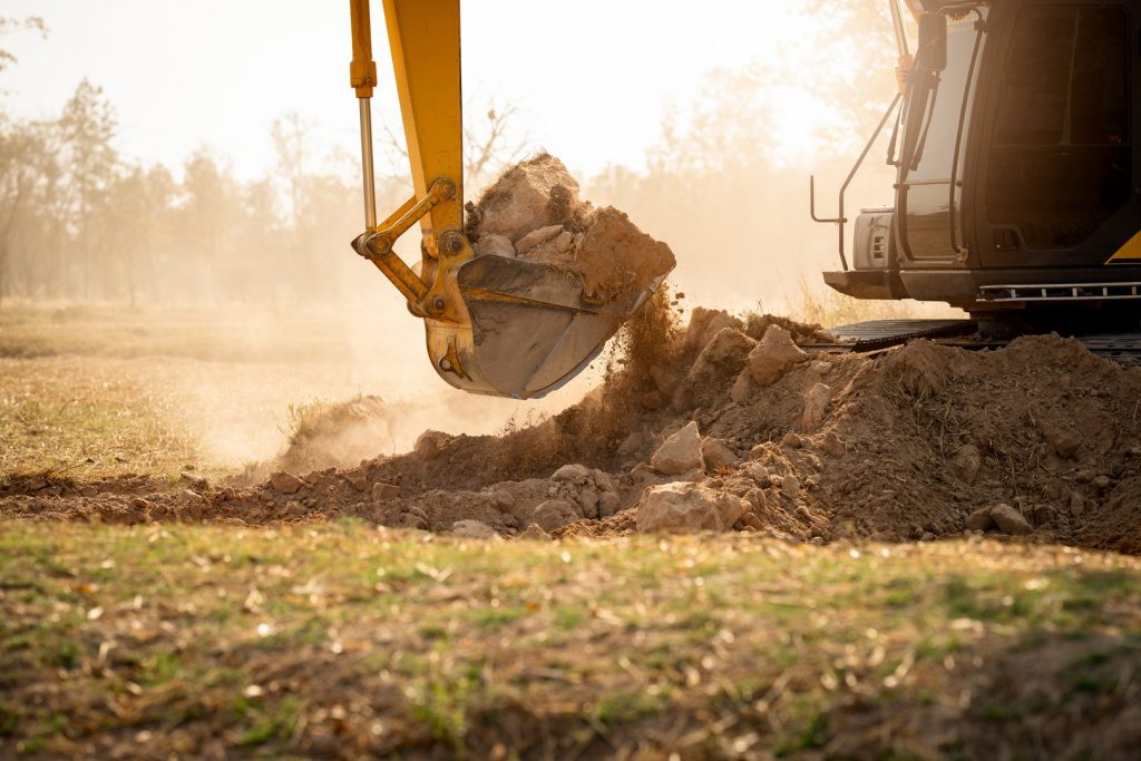 Groundworks backhoe working by digging soil at construction si 2025 01 29 04 39 33 utc